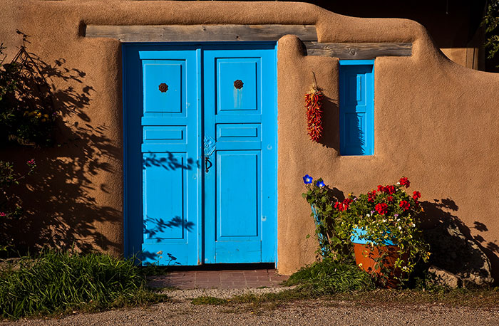 Taos Blue Doors on Adobe Taos New Mexico